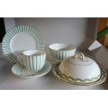 A Coalport part Table Service of fluted design, twenty two pieces and a muffin dish and cover with