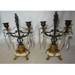 A pair of Empire design gilt metal, two branch, Table Candlesticks, hung with spear and button cut