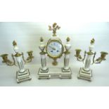 A 19th Century French Garniture, the mantel clock with a white dial and floral painted decoration in