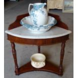 A mahogany bow fronted corner Washstand with galleried back, white marbled top and undertier,