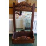 An Edwardian Hall Mirror with upright bevelled plate and glove box under.