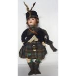 An Armand Marseille Bisque Doll with sleeping eyes, open mouth and dressed in Highland costume,