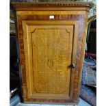 An early 19th Century oak and mahogany banded Corner Wall Cupboard with dentil cornice and inlaid