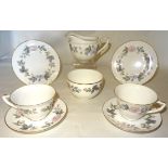 A Royal Worcester June Garland pattern Tea set comprising eight cups, nine saucers, eight plates,