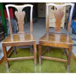 A pair of 18th Century oak Dining Chairs with fiddle splat backs, panelled seats and chamfered