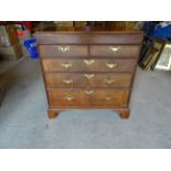 An 18th Century walnut Chest of three long and two short drawers with cross banded drawer fronts and