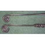 A pair of wrought metal Curtain Poles and fittings, 6' 6" (200cms) long and three shorter matching