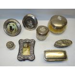 A glass Powder Bowl with silver cover, various glass jars with silver covers and three small