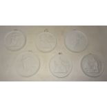 A set of six Royal Copenhagen Parian ware Plaques decorated with raised classical figures. Each 5