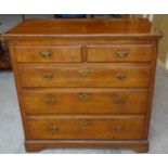 An 18th Century oak Chest of three long and two short graduated drawers with brass handles on