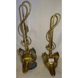 A pair of brass fox mask Doorstops.