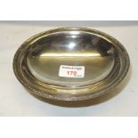 A silver oval Pedestal Dish with engraved border. 6" (15cms) wide. (6.3ozs)