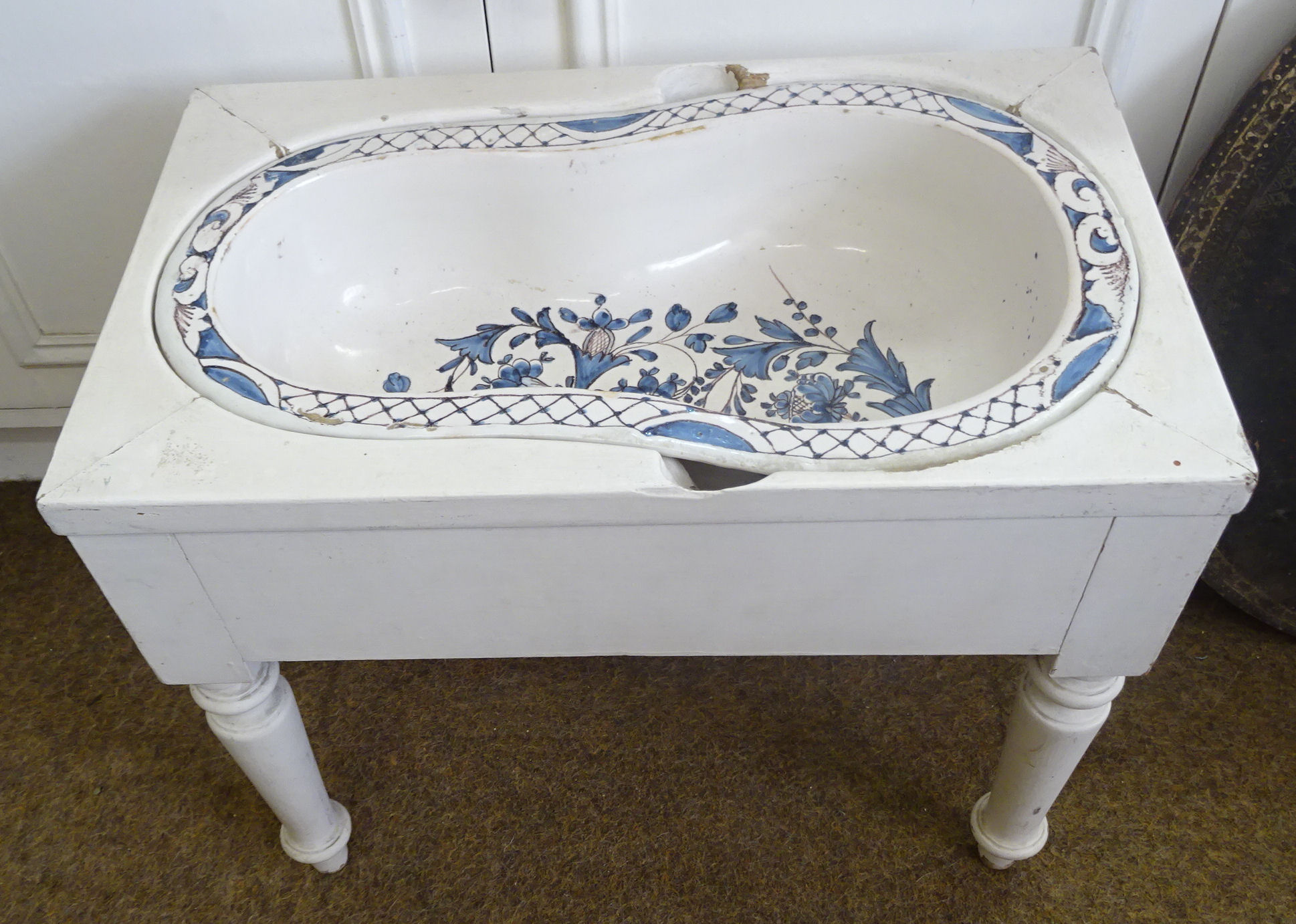 A French Faience Bidet Liner decorated in blue and white with trailing leaves and flowers, the - Image 2 of 2