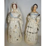 A 19th Century Staffordshire pottery figure of Queen Victoria, 17" (43cms) high and another of