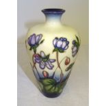 A Moorcroft baluster Vase decorated in the Hepatica pattern. 6" (15cms) high.