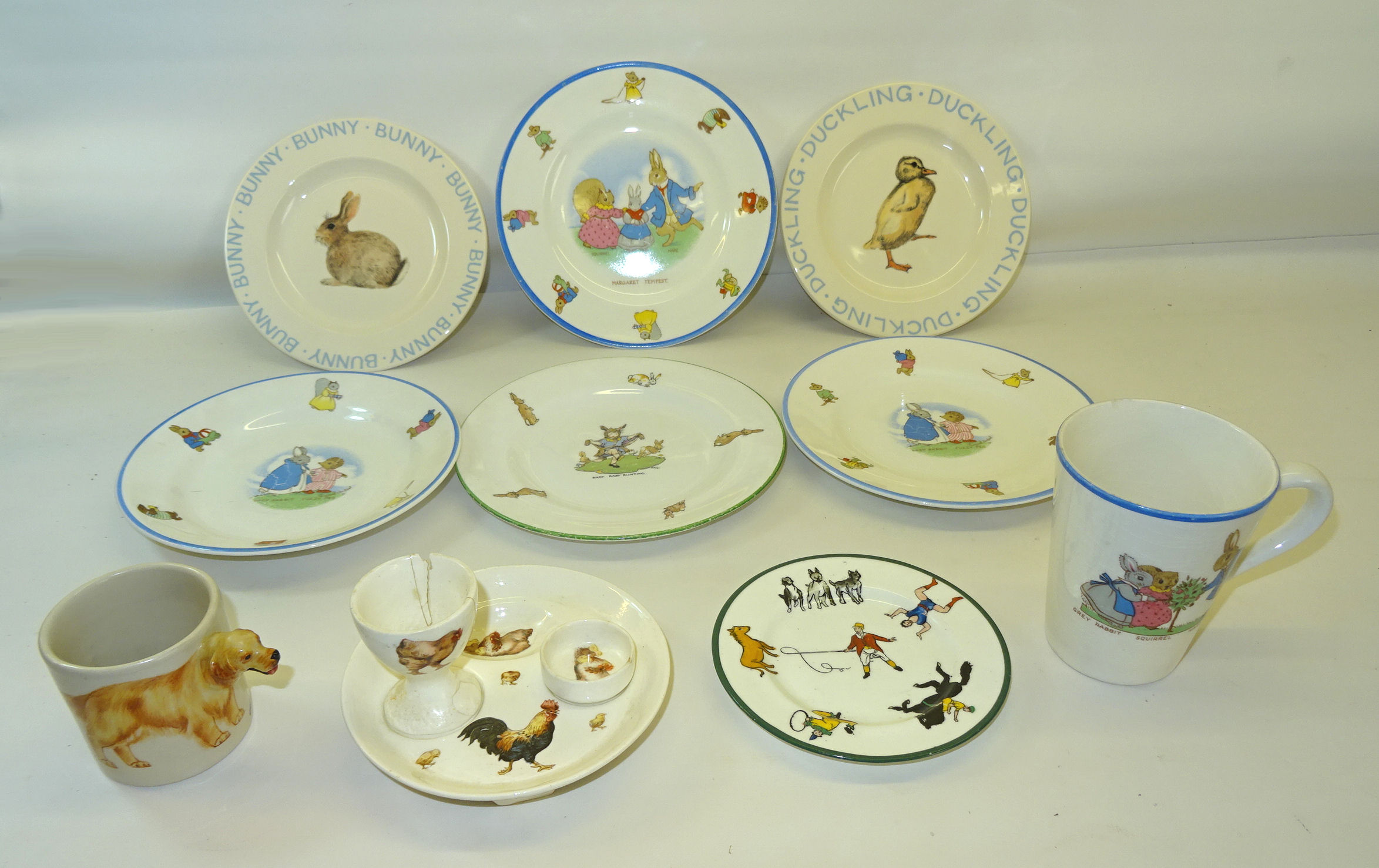 A Bristol 'Little Grey Rabbit' Mug, three matching plates and other items of nursery china.