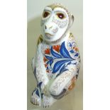 A Royal Crown Derby Macaque Paperweight with gold stopper, boxed.