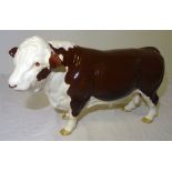 A Beswick model of a Polled Hereford Bull in dark brown gloss with ringed nose.