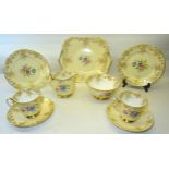 A Shelley China Teaset printed and painted with floral sprays, comprising five cups, six saucers,