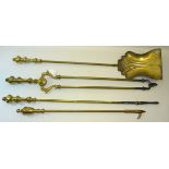 A set of three Victorian brass Fire Irons and a brass Poker.