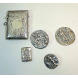 A late Victorian engraved silver Vesta Case, Birmingham 1899; three silver Buttons decorated in