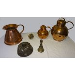 A large copper Jersey Jug by J Quenault, 12" (31cms) high, a similar smaller jug, and other items.