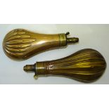 A copper and brass Powder Flask of fluted design with screw off top and another with leaf