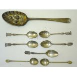 A George III silver Tablespoon with later embossed berry bowl, and five continental souvenir