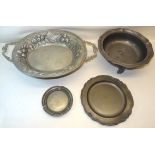 A Continental pewter oval two handled Dish embossed with acorns, leaves, etc., 18" (46cms) wide,