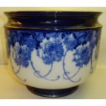 A large Royal Doulton Jardiniere decorated in blue and white with the briar rose pattern, 14" (