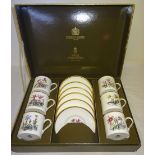 A set of six Royal Worcester Coffee Cans and Saucers decorated with flowers and in presentation