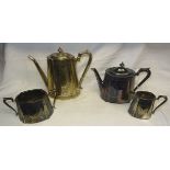 A plated four piece Tea and Coffee Set engraved with flowers and a shield shaped cartouche,