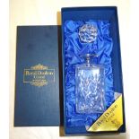 A Royal Doulton crystal Decanter with facet cup stopper in fitted box, and a pair of Webb cut