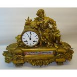 A 19th century French Mantle Clock with white dial in gilded spelter case, inset with a floral