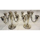 A pair of Continental five light Candelabra with scroll branches and circular bases, 9 1/2" (