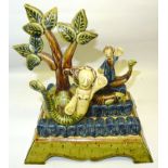 Paul Young, a Studio Pottery Group including a mermaid, fish, trees, etc., on a platform base, 8 1/