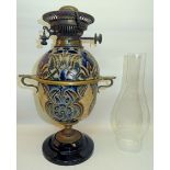 A Victorian Royal Doulton Oil Lamp by Edith Lupton with the assistants mark of Alice Burlton,