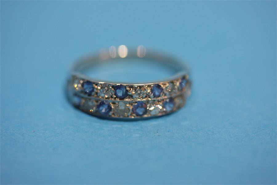 An Antique platinum sapphire and diamond ring. - Image 2 of 2