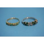 Two 18ct emerald and diamond rings.