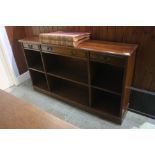 A mahogany dwarf bookcase. 150 cm high