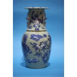 A late 19th century Chinese Celadon vase, decorated in blue relief. 41 cm high