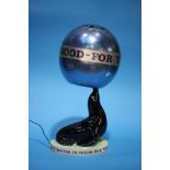 A 'Guinness is Good for You' seal table lamp with blue metallic spherical shade, printed marks to