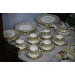 A Wedgwood 'Gold Florentine' dinner and tea set.