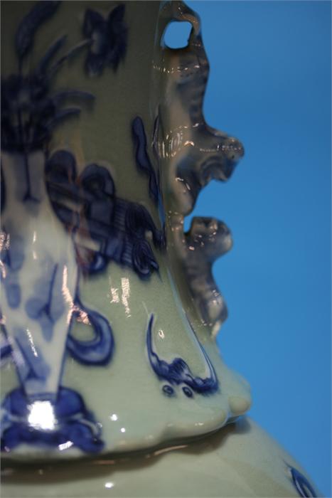 A late 19th century Chinese Celadon vase, decorated in blue relief. 41 cm high - Image 8 of 9