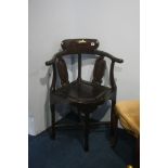 An Oriental design corner chair.