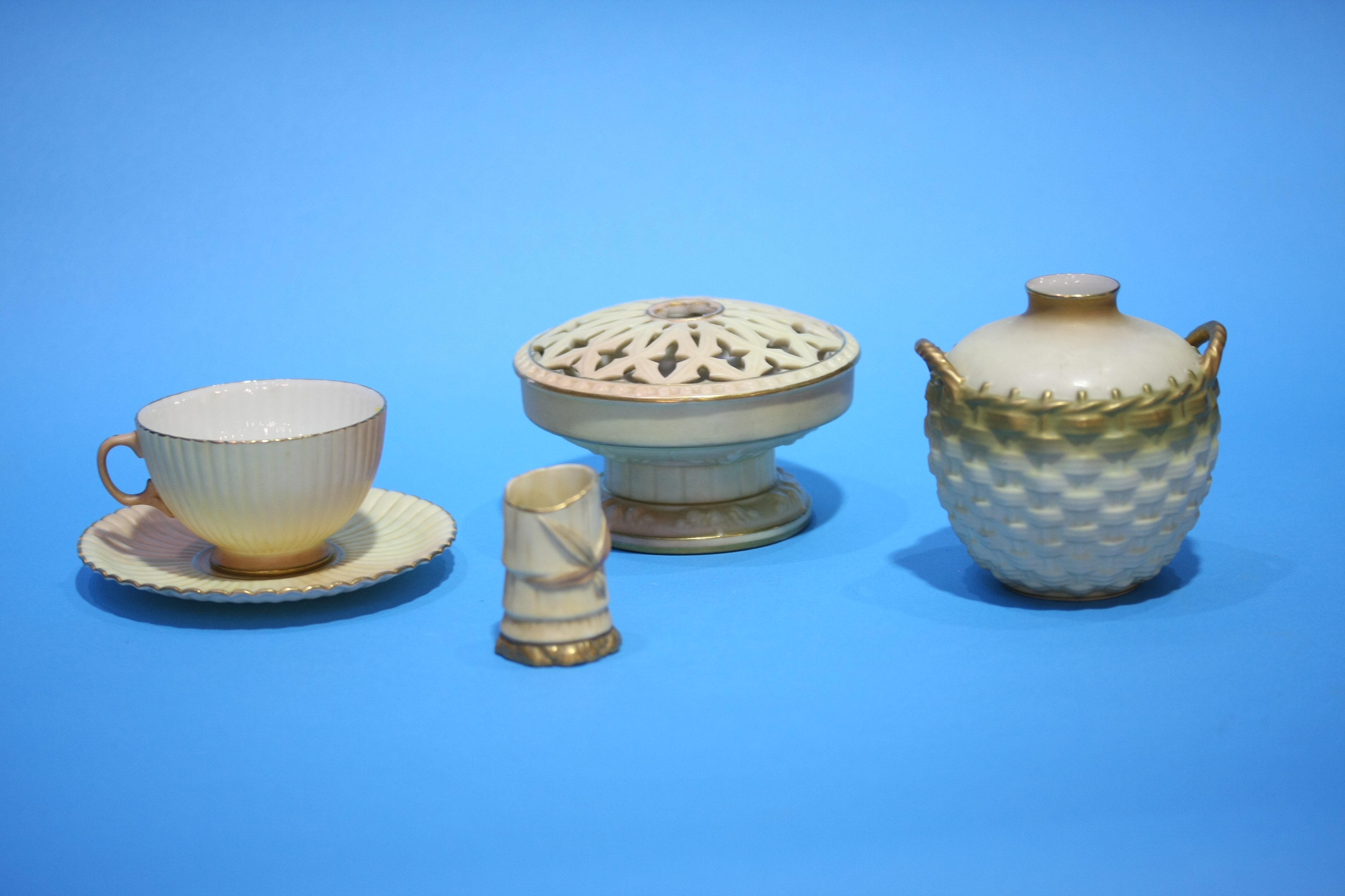 A Royal Worcester pot pourri, a small Worcester basket etc. (4)