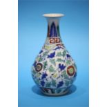A Chinese baluster shaped vase decorated with geometric designs and flowers, bears Wucai mark to