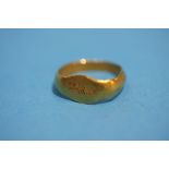 A Babies Roman gold ring.