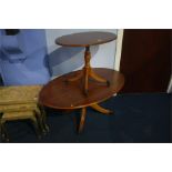 Two yew wood oval tables.
