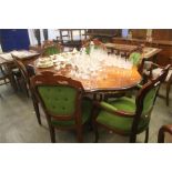 An Italian style dining table and six chairs.